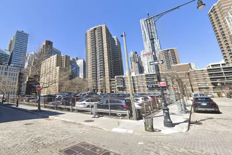 Google Street view of 250 Water Street parking lot with tall buildings in background